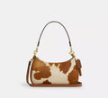 Teri Shoulder Bag In Haircalf With Cow Print